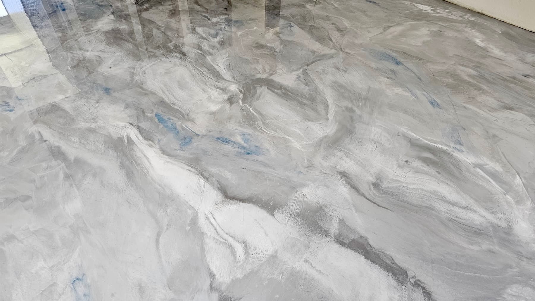 Blue swirl metallic epoxy floor